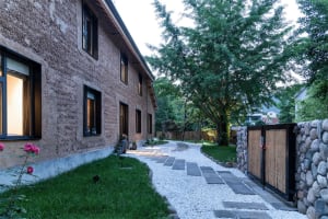 A modern residential exterior made of concrete.