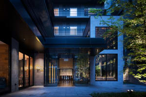 Modern architecture featuring glass walls in an interior space.