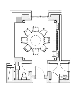A 2D architectural drawing of a modern interior space with mixed materials and functional zones.