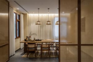 Modern interior design of a casual dining room with wooden materials and a relaxed atmosphere.