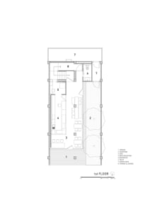 Floor plan of a hotel showing rooms, bathrooms, and service areas.