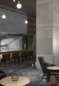 Modern interior design featuring office lounge with wood and concrete materials
