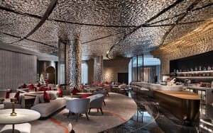 Modern lounge area with metallic textured ceiling, contemporary furniture, and a bar counter.