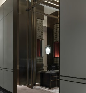 Modern lobby with glass and metal elements.