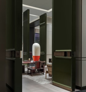 Modern office interior design featuring wooden furniture and marble accents