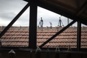 Modern roof statues decorated with clay tiles in a contemporary setting.