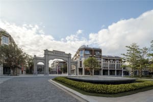 A modern commercial space with concrete and glass materials.