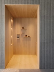A minimalist interior designed with wood elements.