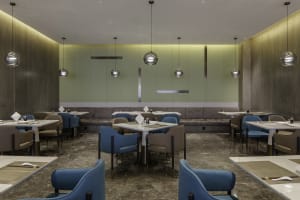 A sleek, modern restaurant dining room with contemporary decor and clean lines.