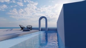 Modern minimalist outdoor pool deck overlooking the ocean, featuring concrete and steel materials.