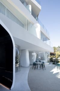 Modern restaurant with glass and concrete exterior and interior design
