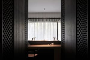 Modern interior design home office with minimalist furniture and natural light.