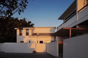 Modern building exterior with white walls and glass windows
