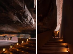 Stone spa interior with lanterns and steps leading downward.