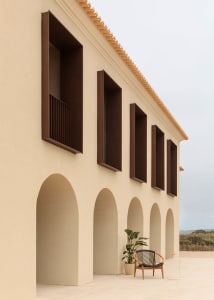 A minimalist building with concrete exterior features.