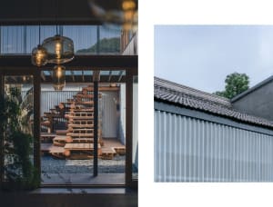 An industrial-style, wooden sculpture resembling a tree with a wooden beam supporting a roof, located in an architectural ind