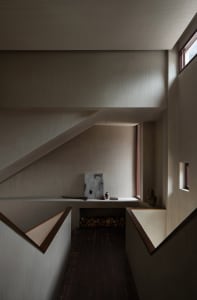 A modern staircase made of concrete with minimalist design elements.
