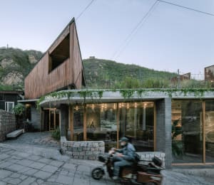Modern residence with concrete exterior and wooden accents