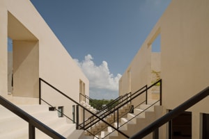 A modern architectural space featuring modular concrete structures.