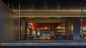 Modern, sleek restaurant interior with metal accents