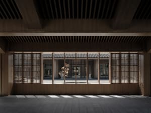 Industrial-style room with wooden frame and traditional Japanese architecture elements.
