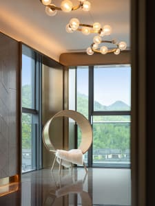 A modern living room with a large glass window