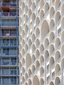 Modern glass building with repeating architectural features
