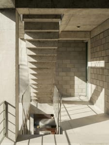 Modern indoor staircase constructed of concrete.