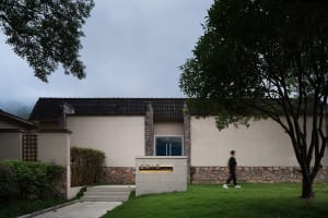 A minimalist building exterior crafted from concrete materials.