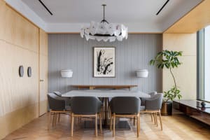 Modern dining room with wood and concrete materials