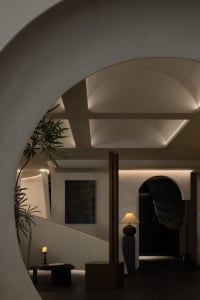 Modern minimalist hallway with concrete walls and stone flooring