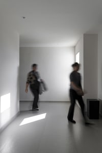 A minimalist interior design featuring concrete materials.