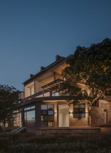 Modern residential exterior with concrete and stone materials.