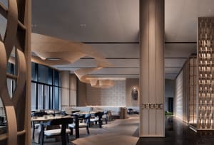 Modern restaurant interior with wood, glass, and stone materials