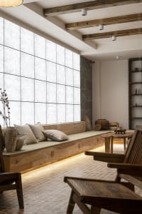 Interior design featuring industrial living room with wooden furniture and floor.