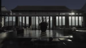 Modern hotel lobby made of concrete and glass.