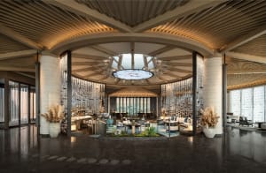 A modern hotel lobby featuring glass and concrete materials