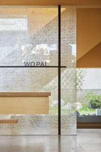 Modern retail storefront featuring a glass wall