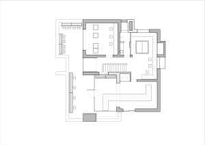 Floor plan of a residential space with a laminated floor and wooden accent elements.