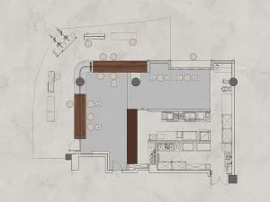 2D floor plan of a modern restaurant with dining tables and chairs, featuring a functional layout and linework