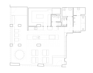 Empty white room with a minimalist design featuring simple lines and shapes, showing various rooms including a dining area, kitchen, living room, and bedroom