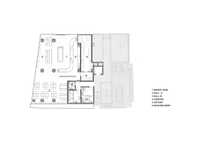 2D floor plan of a modern restaurant with dining and kitchen areas, featuring multiple tables, chairs, and sinks