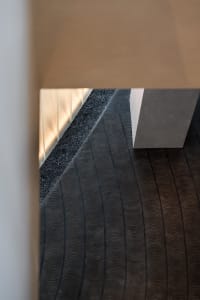 Carpeted room with a black and white design, wool carpet, and modern interior design