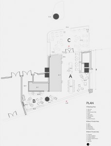2D floor plan of a modern hotel with dining and sitting areas, labeled and measured for clarity