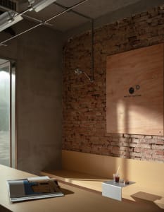Warm and inviting coffee shop interior with a brick wall, wooden countertops, and a cup on a table