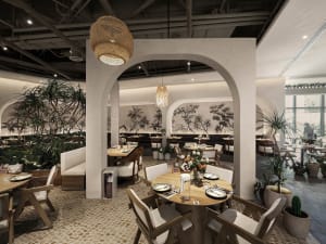 A dining area with tables, chairs, couches, and potted plants, surrounded by artwork and reflecting Asian cultural influence