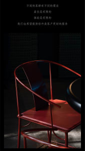 A modern dining space with a metal chair in front of a black table, set in a stylish and contemporary atmosphere