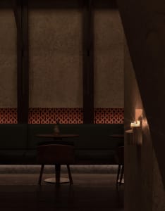 An inviting restaurant interior with a dining table, patterned walls, and a vase on the table