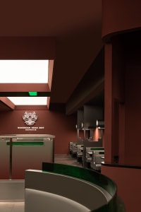 Modern restaurant interior with tables, chairs, couches, artwork, and a modern design