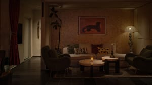 Cozy living space with a couch, chair, table, and potted plants, adorned with a painting and a vase, creating a warm and inviting atmosphere